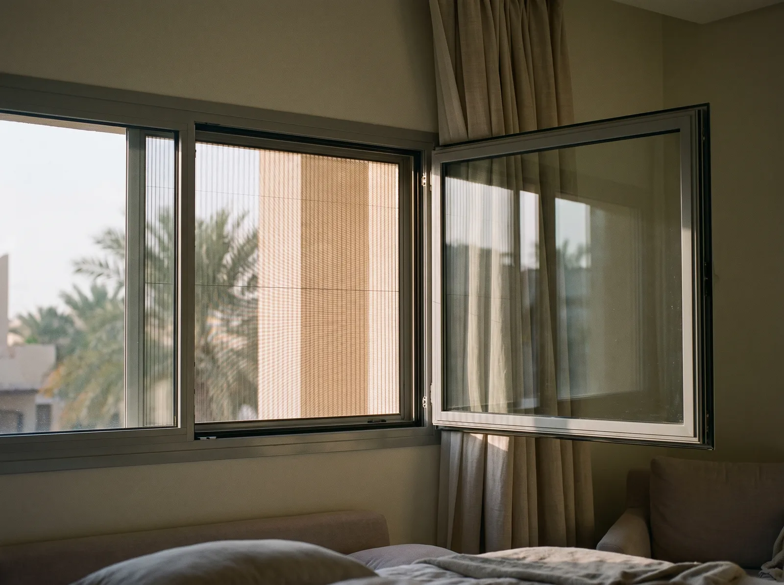 Fixed or retractable mosquito net for a window?